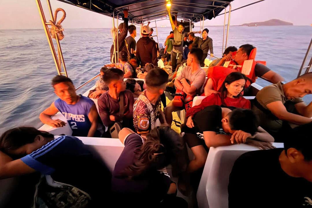 A boat carries rescued passengers in the waters around Isabela City, Basilan Province, Philippines, on Jan. 26, 2026, after the sinking of M/V Trisha Kerstin 3, an inter-island cargo and passenger ferry. (Kagawad Gamar “Gams” Alih via AP)
