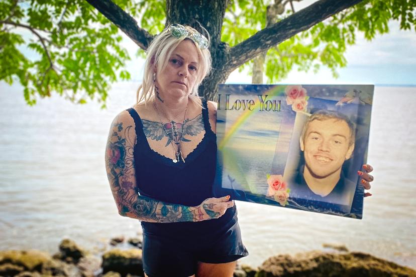 April Babcock holds a picture of her son Austen, who died in January 2019 after unknowingly taking some fentanyl-laced cocaine. (Courtesy of April Babcock)