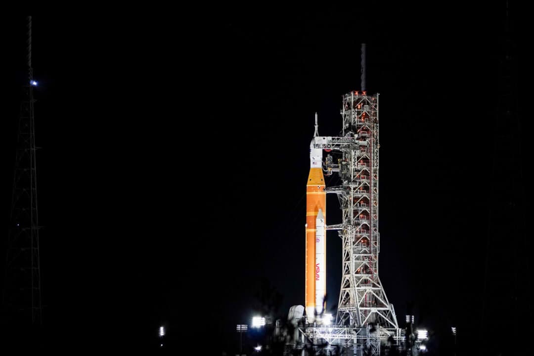 NASA’s Orion crew capsule sits atop the Space Launch System moon rocket ahead of the Artemis II mission on Launch Complex 39B at Kennedy Space Center on Merritt Island, Fla., on Feb. 1, 2026. (T.J. Muscaro/The Epoch Times)