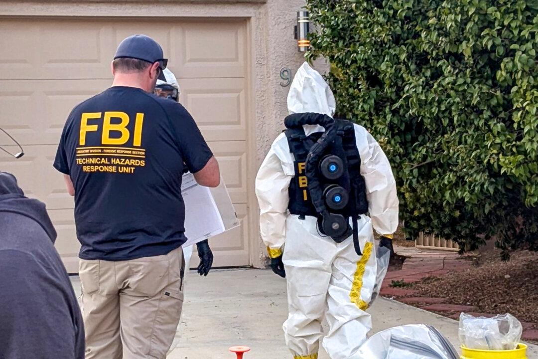 Authorities search a house on Sugar Springs Drive in Las Vegas on Jan. 31, 2026. The discovery of the suspected illegal biolab left residents uneasy, with some asking how it went unnoticed in an active crime-watch community. (FBI)