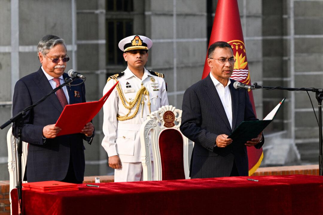 Tarique Rahman, Chair of the Bangladesh Nationalist Party, takes the oath as Prime Minister of Bangladesh from President Mohammed Shahabuddin (L) at the National Parliament in Dhaka, Bangladesh, on Feb. 17, 2026. (Mahmud Hossain Opu/AP Photo)