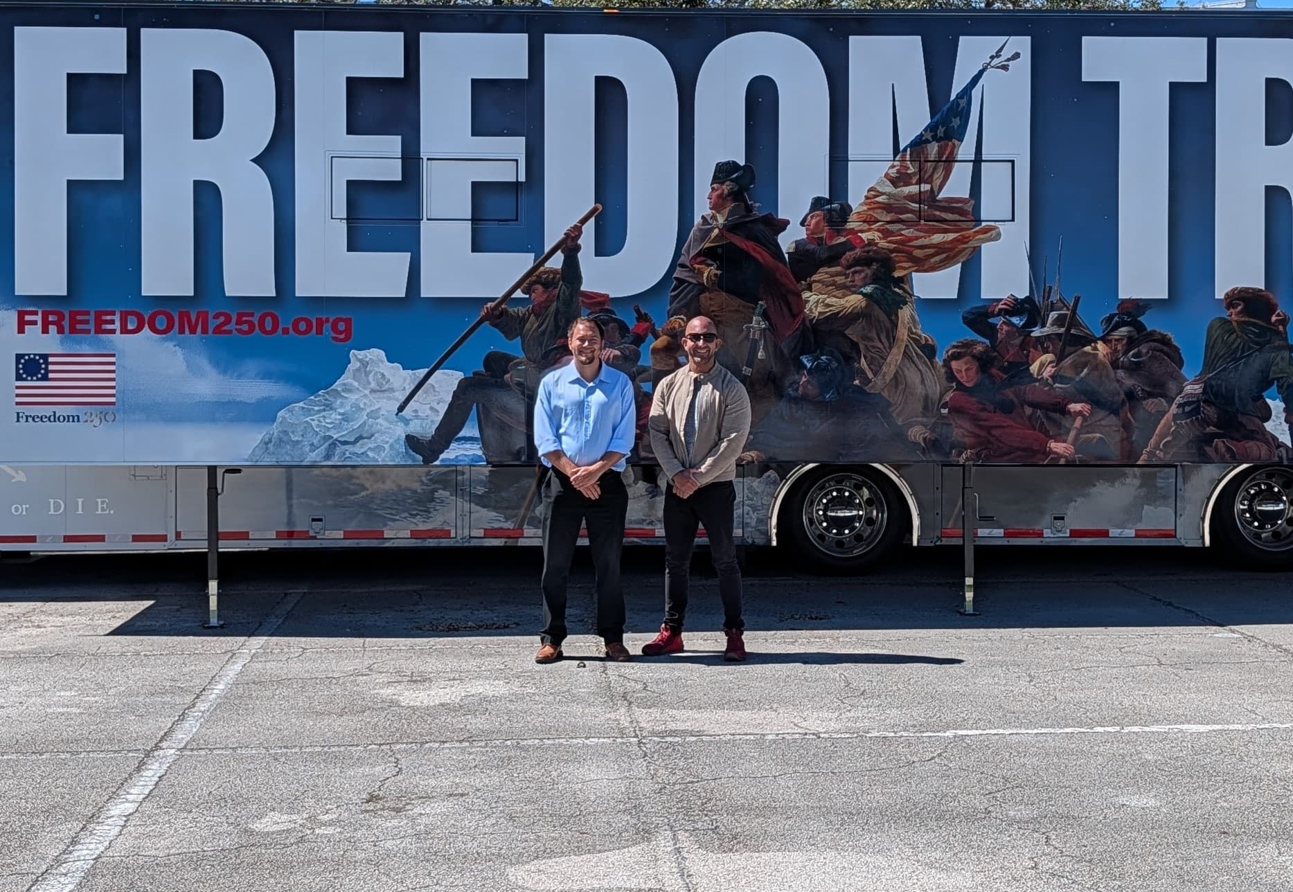 Freedom 250’s Timothy Crawford (L) and Nick Bravo (R ) brought their mobile museum “Freedom Truck” to Florida Atlantic University in Boca Raton, Fla., on Feb. 23, 2026. (Jacob Burg/The Epoch Times)