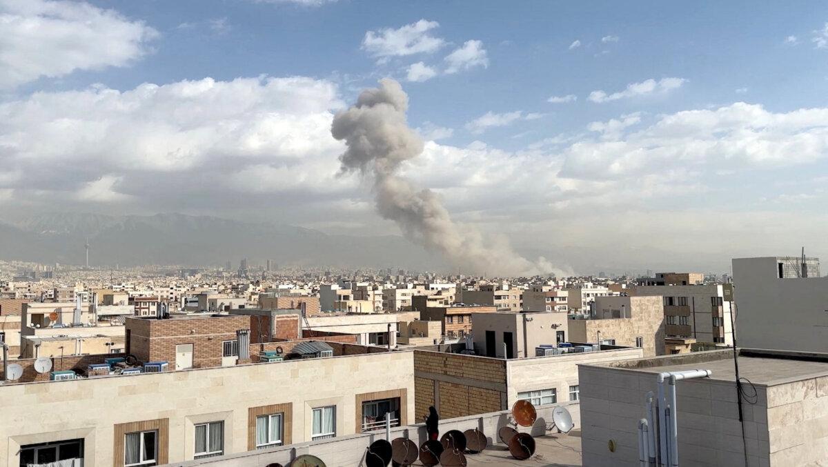 Smoke rises following an explosion, after Israel's defense minister said Israel had launched a pre-emptive attack in Tehran on Feb. 28, 2026. (West Asia News Agency/Handout via Reuters)