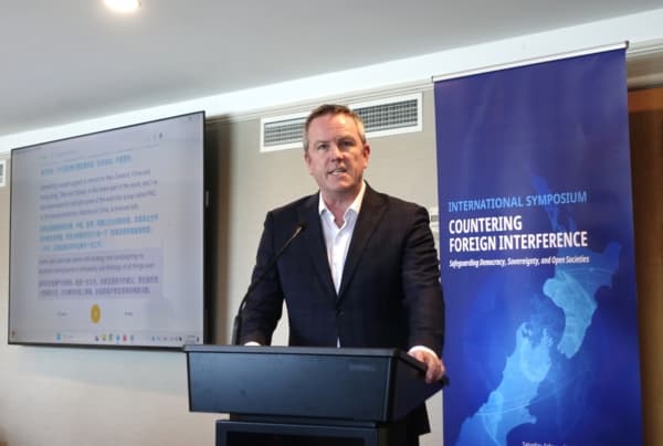 Former MP Simon O’Connor speaking at the symposium titled "Countering Foreign Interference" in Auckland, New Zealand, on Feb. 21, 2026. (Zhao Kai/The Epoch Times)