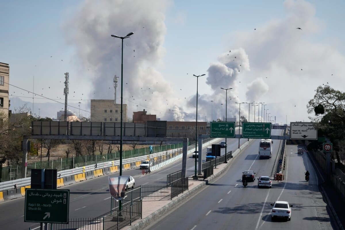 Plumes of smoke rise after U.S.–Israeli strikes in Tehran, Iran, on March 5, 2026. (Vahid Salemi/AP Photo)