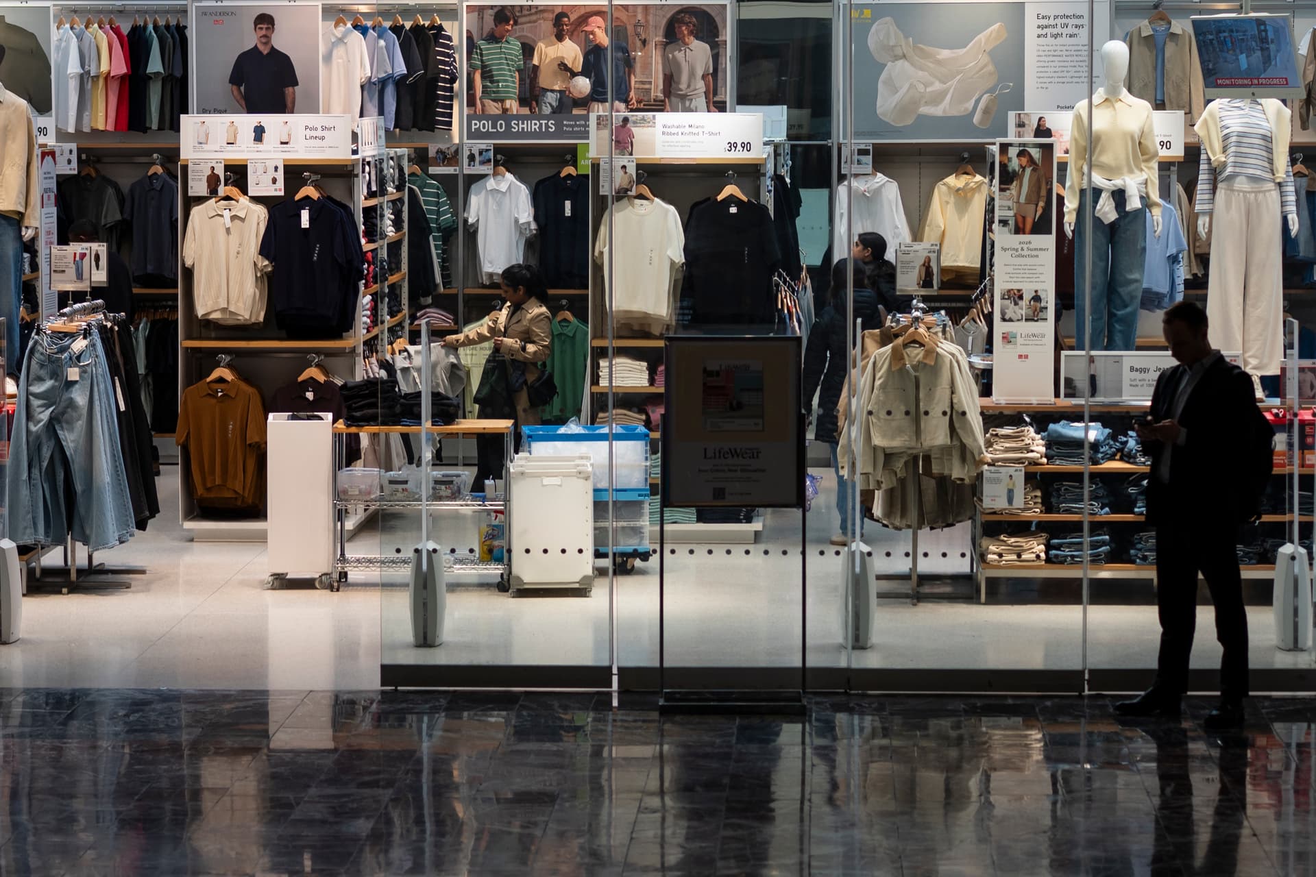 People shop in Washington on March 12, 2026. (Madalina Kilroy/The Epoch Times)