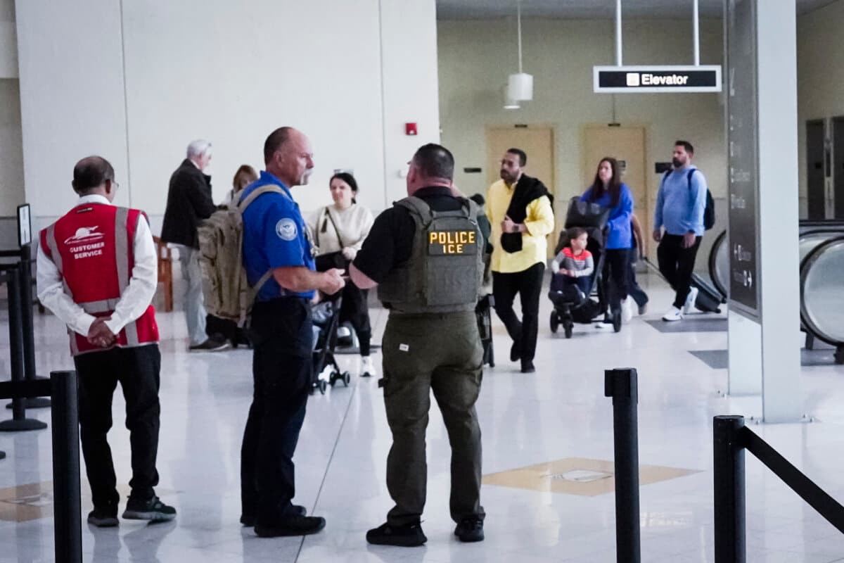 Travelers line up at the security checkpoint area at Southwest Florida International Airport in Fort Myers, Fla., on March 23, 2026, as the Homeland Security Department deploys Immigration and Customs Enforcement agents to help the Transportation Security Administration at some airports. (Jacob Burg/The Epoch Times)