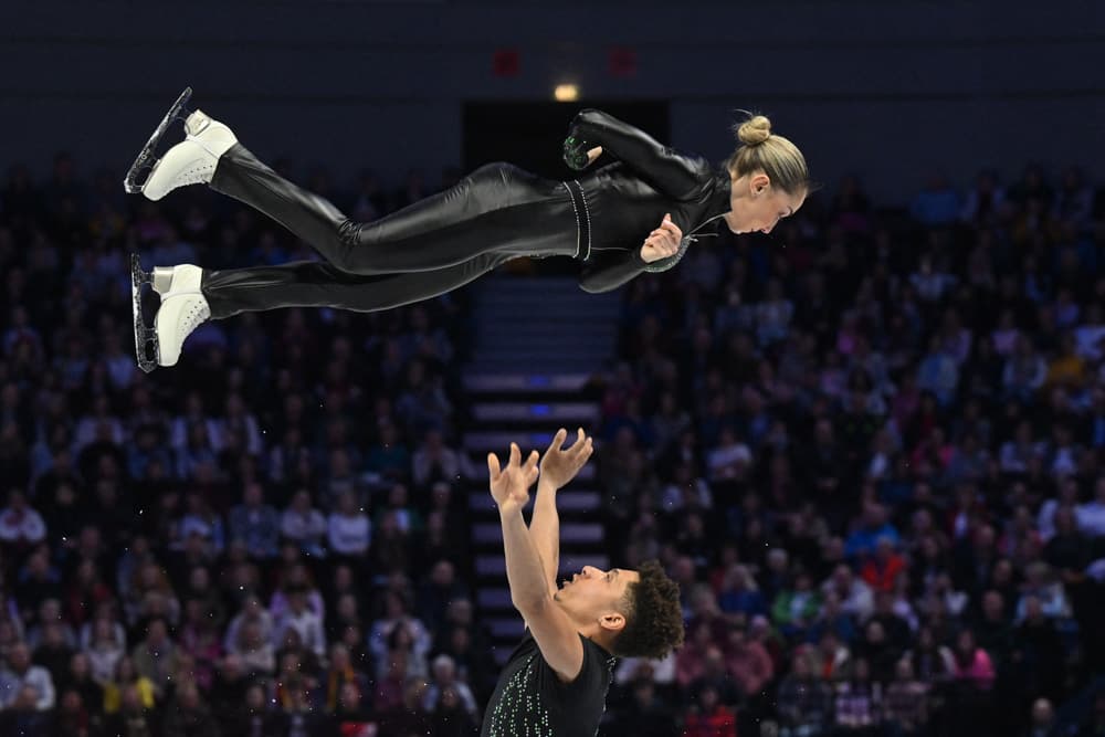 Switzerland's Oxana Vouillamoz and Tom Bouvart perform during the pairs free skating program of the 2026 ISU Figure Skating World Championships in Prague on March 26, 2026. (Michal Cizek / AFP via Getty Images)
