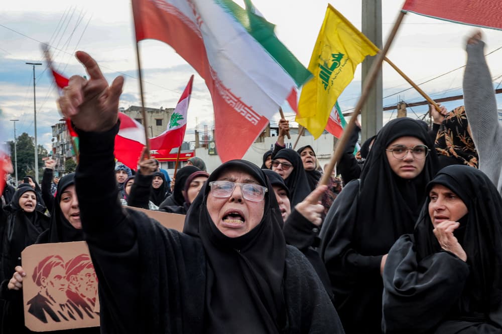 Demonstrators attend a rally organized by Lebanese political parties supporting the Hezbollah movement outside the Iranian embassy in Beirut, Lebanon, on March 26, 2026. (Anwar Amro/AFP via Getty Images)