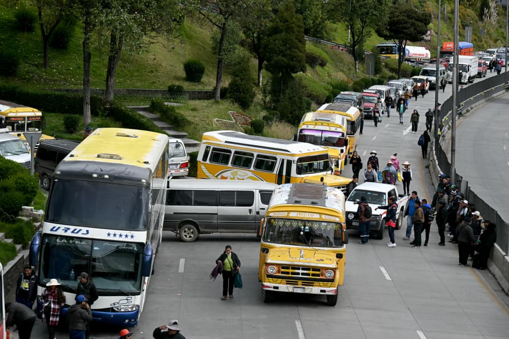 Members of the transport workers' union block a road during the second day of a strike over diesel quality in La Paz, Bolivia, on March 26, 2026. (Aizar Raldes/AFP via Getty Images)