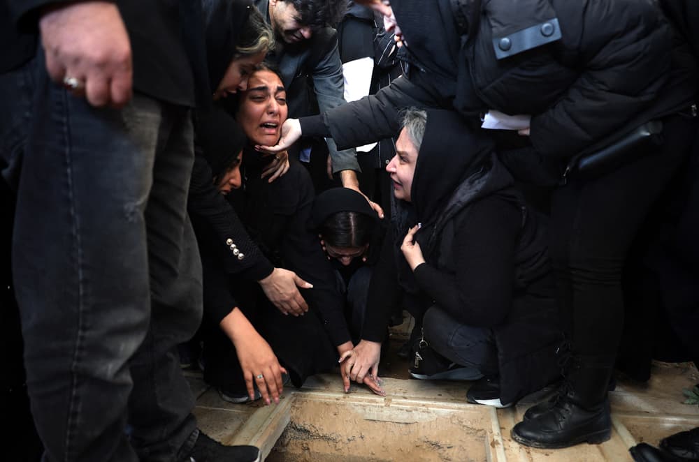 Iranian women mourn at a funeral for victims of the Middle East war at the Behesht Zahra cemetery in southern Tehran on March 26, 2026. (AFP via Getty Images) 