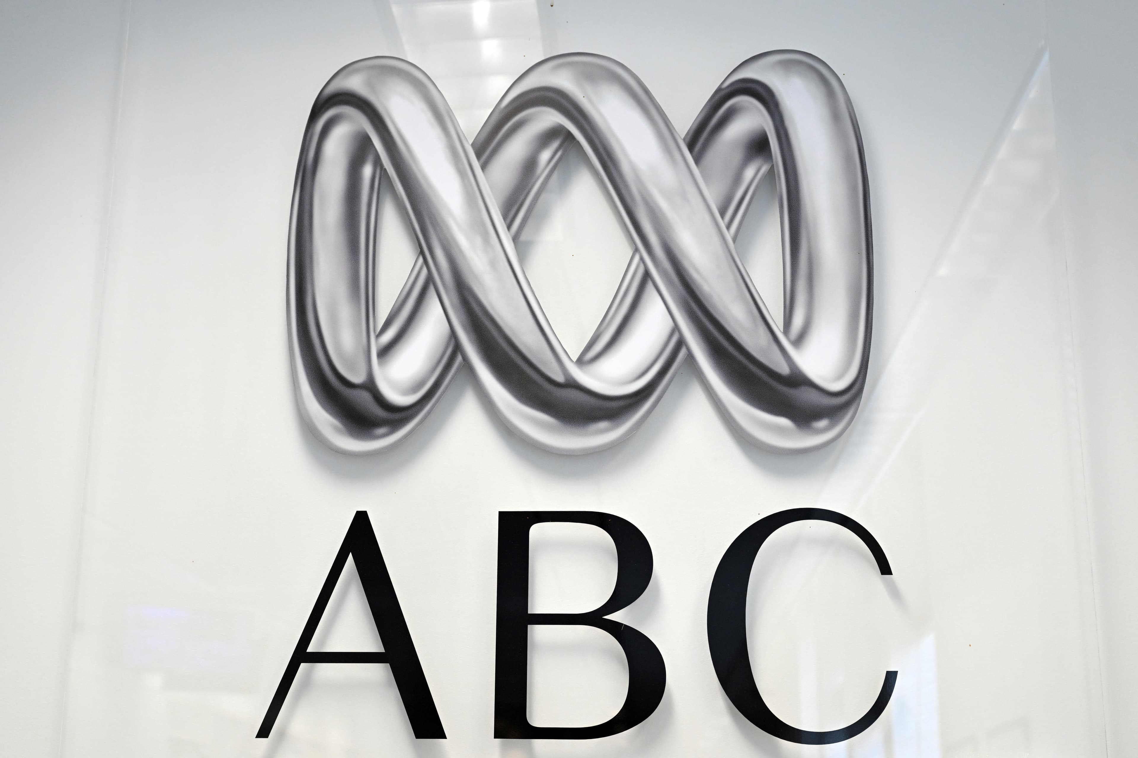 The Australian Broadcasting Corporation (ABC) logo is seen in the press gallery at Parliament House in Canberra, Australia, on Feb. 25, 2025. (AAP Image/Mick Tsikas)