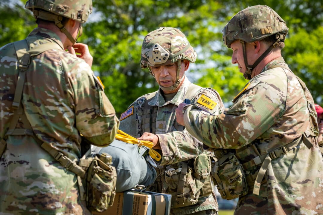 Soldiers with the U.S. Army take part in combat exercises during Infantry Week at Fort Benning, Ga., on April 9, 2026. The event tests their strength, teamwork, and technical proficiency across ground combat disciplines through five competitions. (John Fredricks/The Epoch Times)