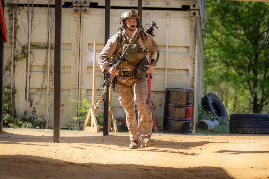 U.S. Marine Staff. Sgt. Tyler Johnson of the U.S. Marine Corps performs shooting exercises during Infantry Week at Fort Benning, Ga., on April 8, 2026. (John Fredricks/The Epoch Times)
