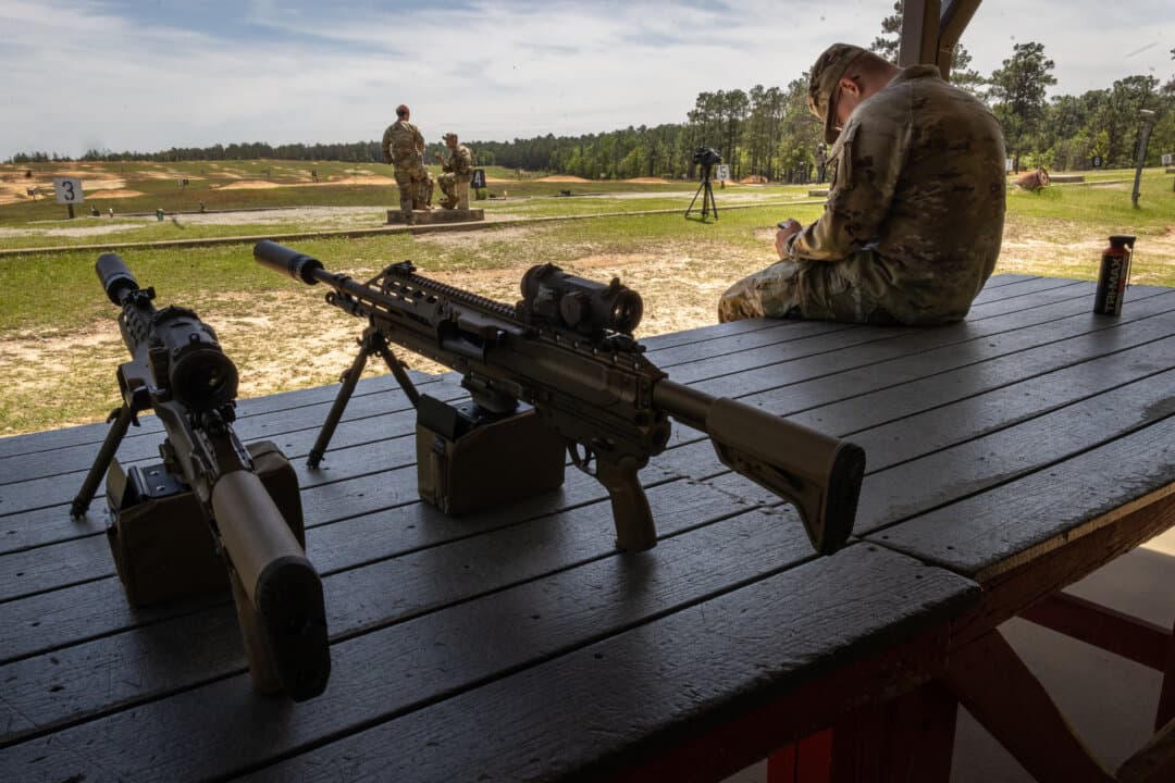 Soldiers of the United States Army perform shooting exercises at Fort Benning, Ga., on April 9, 2026. (John Fredricks/The Epoch Times)