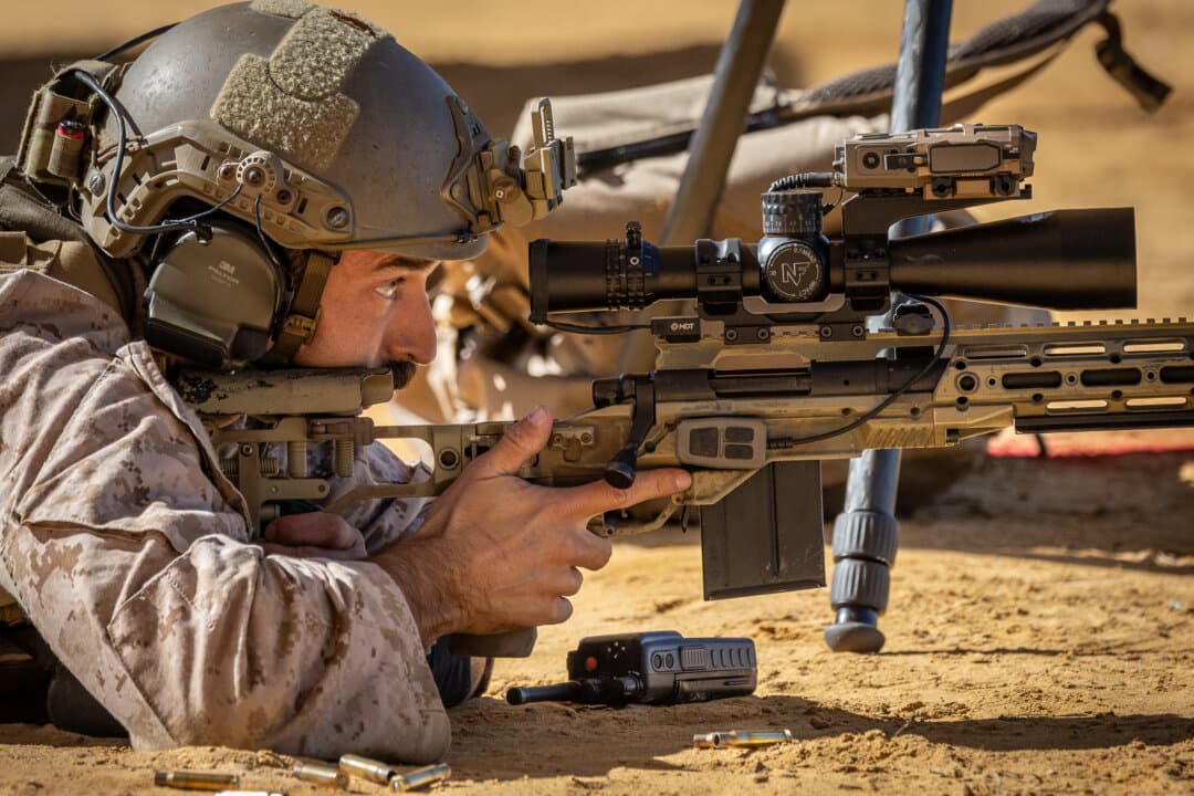 U.S. Marine Staff. Sgt. Tyler Johnson of the United States Marine Corps (USMC) performs shooting exercises at Fort Benning, Ga., on April 8, 2026. (John Fredricks/The Epoch Times)