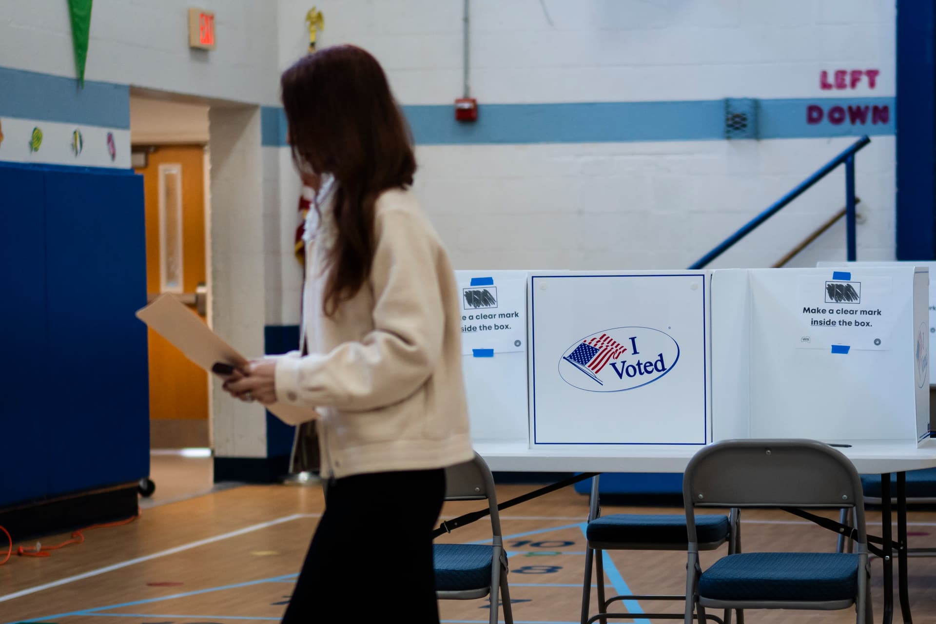 A voter at a polling site during the redistricting referendum in Alexandria, Va., on April 21, 2026. (Madalina Kilroy/The Epoch Times)