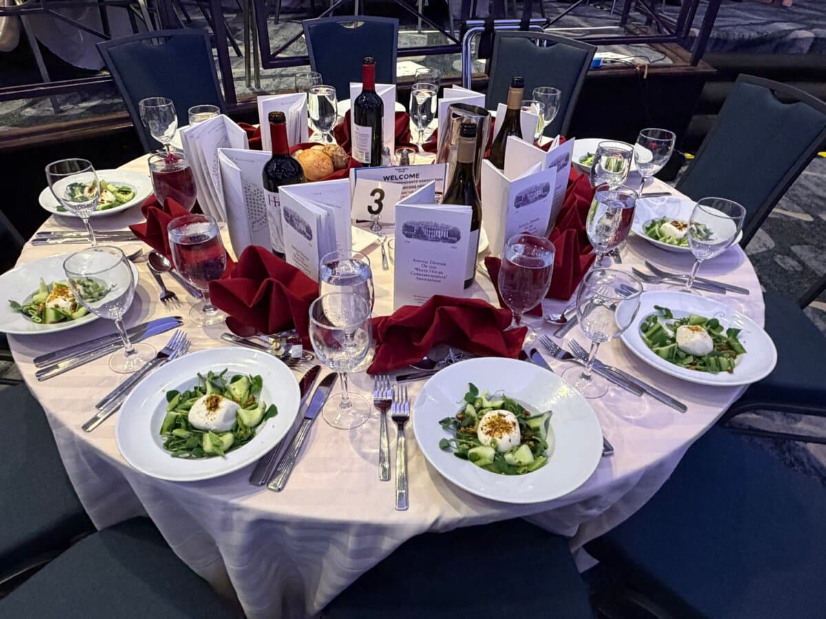 Attendees ate their salads and were awaiting the main course at the White House Correspondents' Dinner in the International Ballroom at the Washington Hilton hotel on April 25, 2026, when the event was disrupted by an attack. (Travis Gillmore/The Epoch Times)