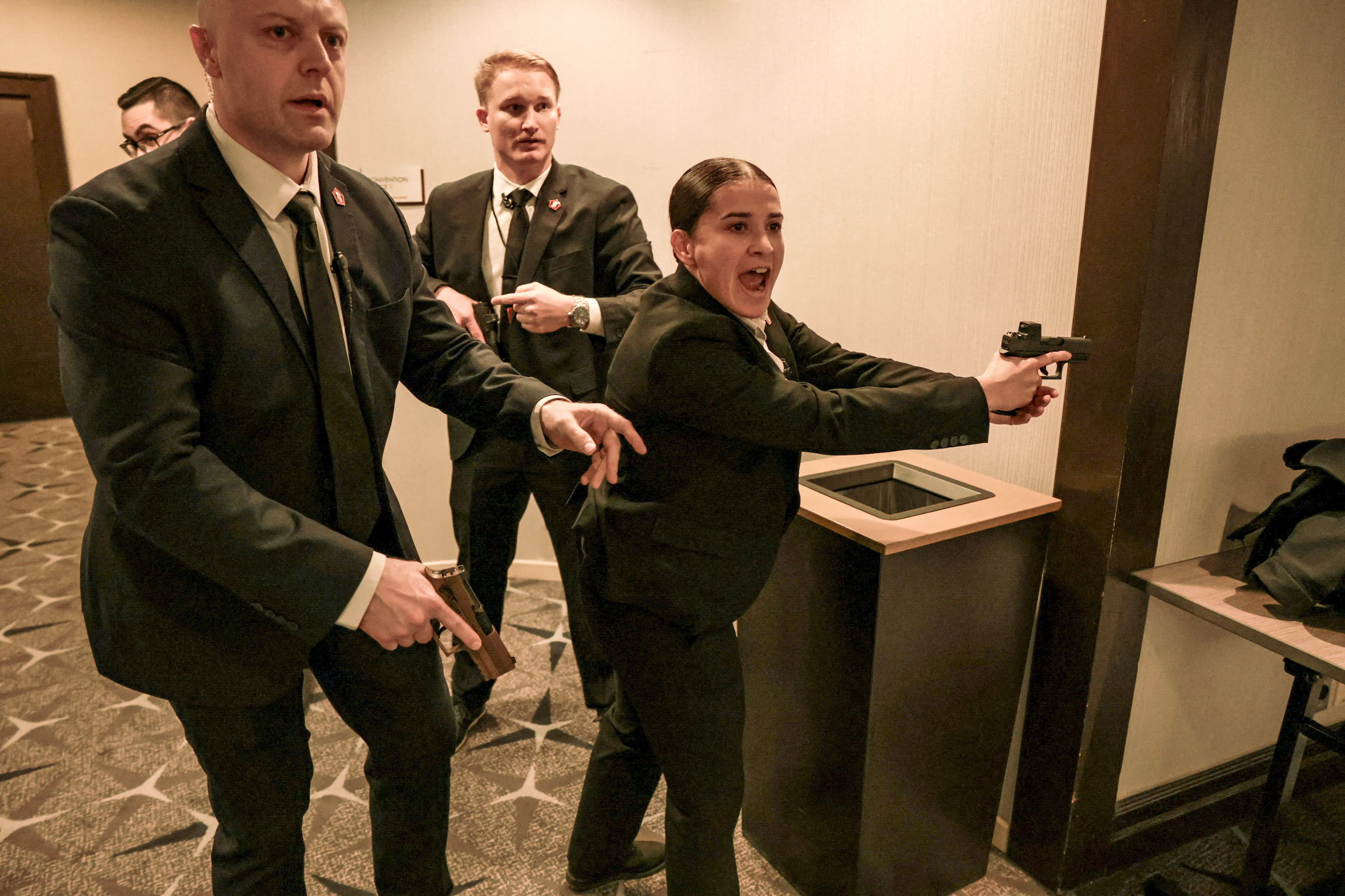 Secret Service agents respond to a shooting after a gunman rushed past security. (REUTERS/Jonathan Ernst)