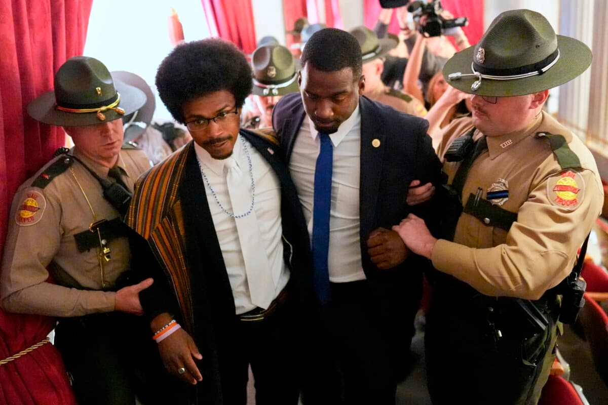 Rep. Justin J. Pearson (D-Memphis) (2nd L) walks with his brother KeShaun Pearson, as he is arrested and removed from the House gallery during a special session of the state legislature to redraw U.S. Congressional voting maps in Nashville, Tenn., on May 7, 2026. (George Walker IV/AP Photo)