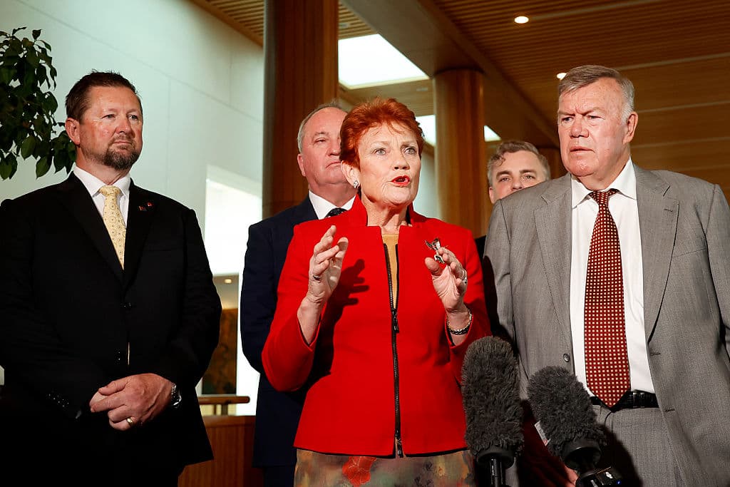 One Nation Leader Pauline Hanson (L) and incoming member for Farrer David Farley (R) attend a press conference at Parliament House in Canberra, Australia on May 13, 2026. (Hilary Wardhaugh/Getty Images)
