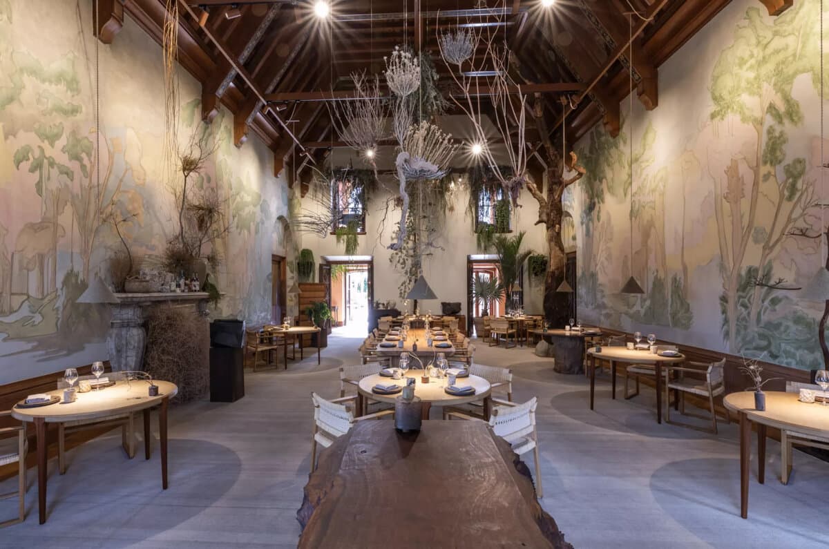 Inside the dining room of Noma LA at the Paramour Estate in Silver Lake, decorated with hanging plants. (Myung J. Chun/Los Angeles Times/TNS)