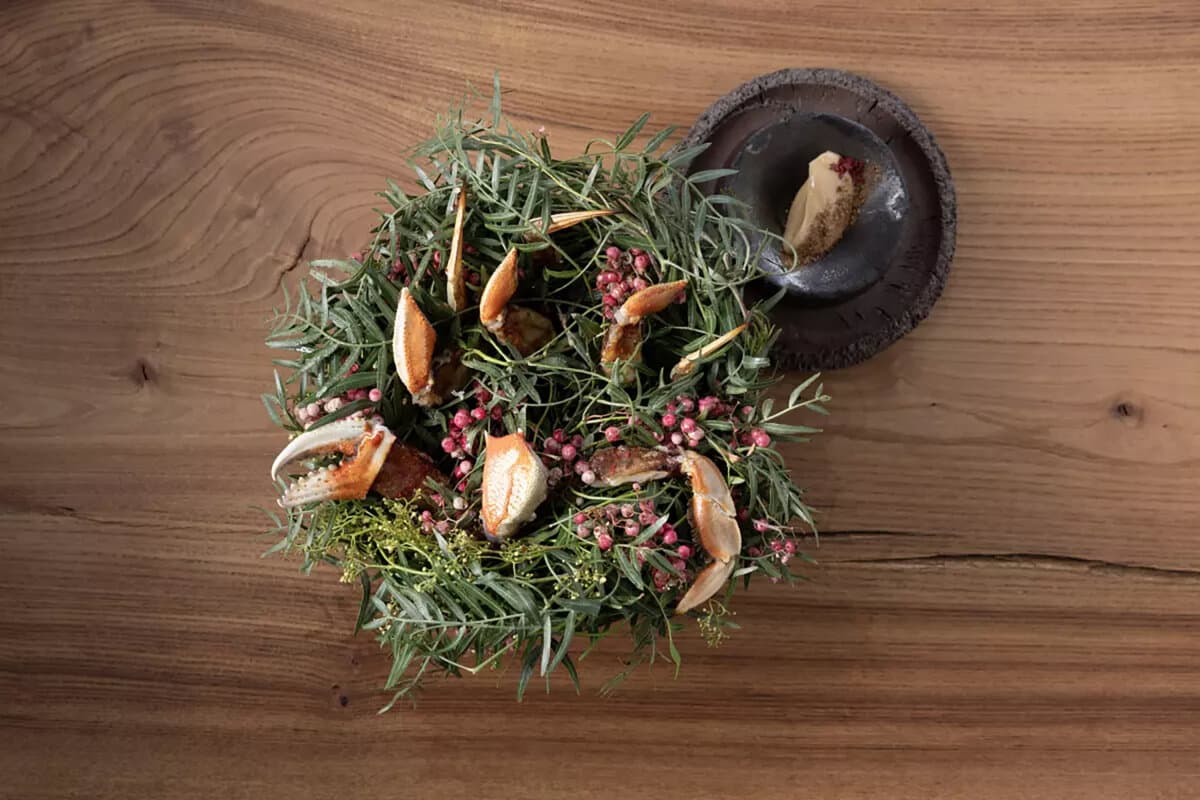Dungeness crab garnished with pink peppercorns. (Myung J. Chun/Los Angeles Times/TNS)
