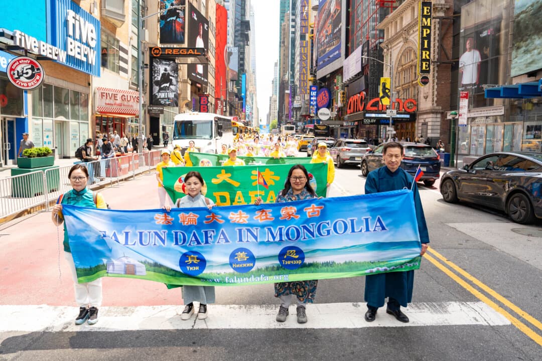 Falun Gong practitioners take part in a parade to celebrate World Falun Dafa Day and call for an end to persecution in China, in New York City, on May 13, 2026. (Samira Bouaou/The Epoch Times)