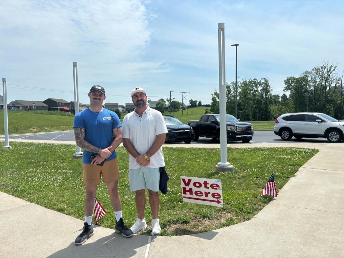 Social media content creators Zachary Foust (L) and Bobby Sauce conducted exit polls in Boone County, Ky. on May 19, 2026. (Jeff Louderback/The Epoch Times)
