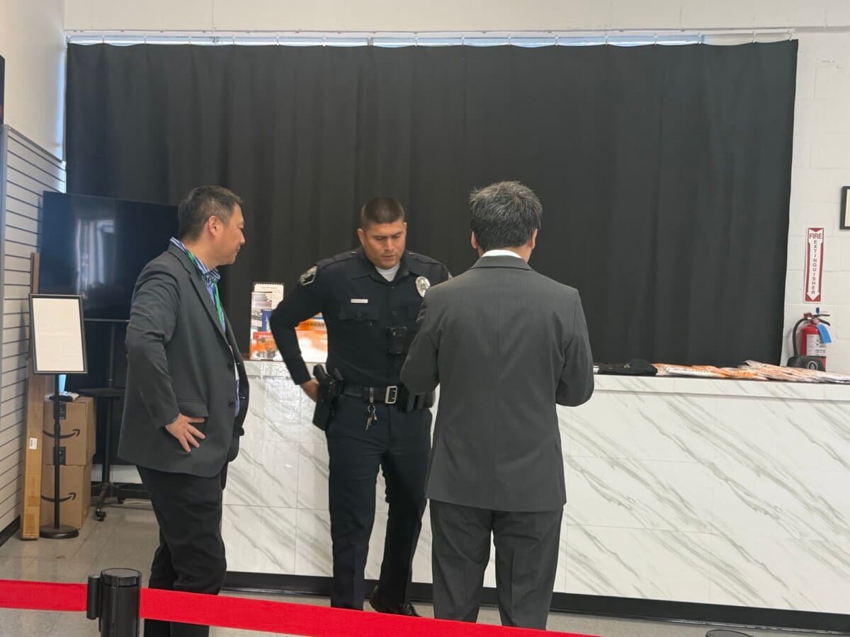 Intruders vandalized the June 4th Massacre Memorial Museum in El Monte, Calif., on May 31, 2026. Museum director Wang Dan (L) speaks with police investigators. (Ma Shang’en/The Epoch Times)