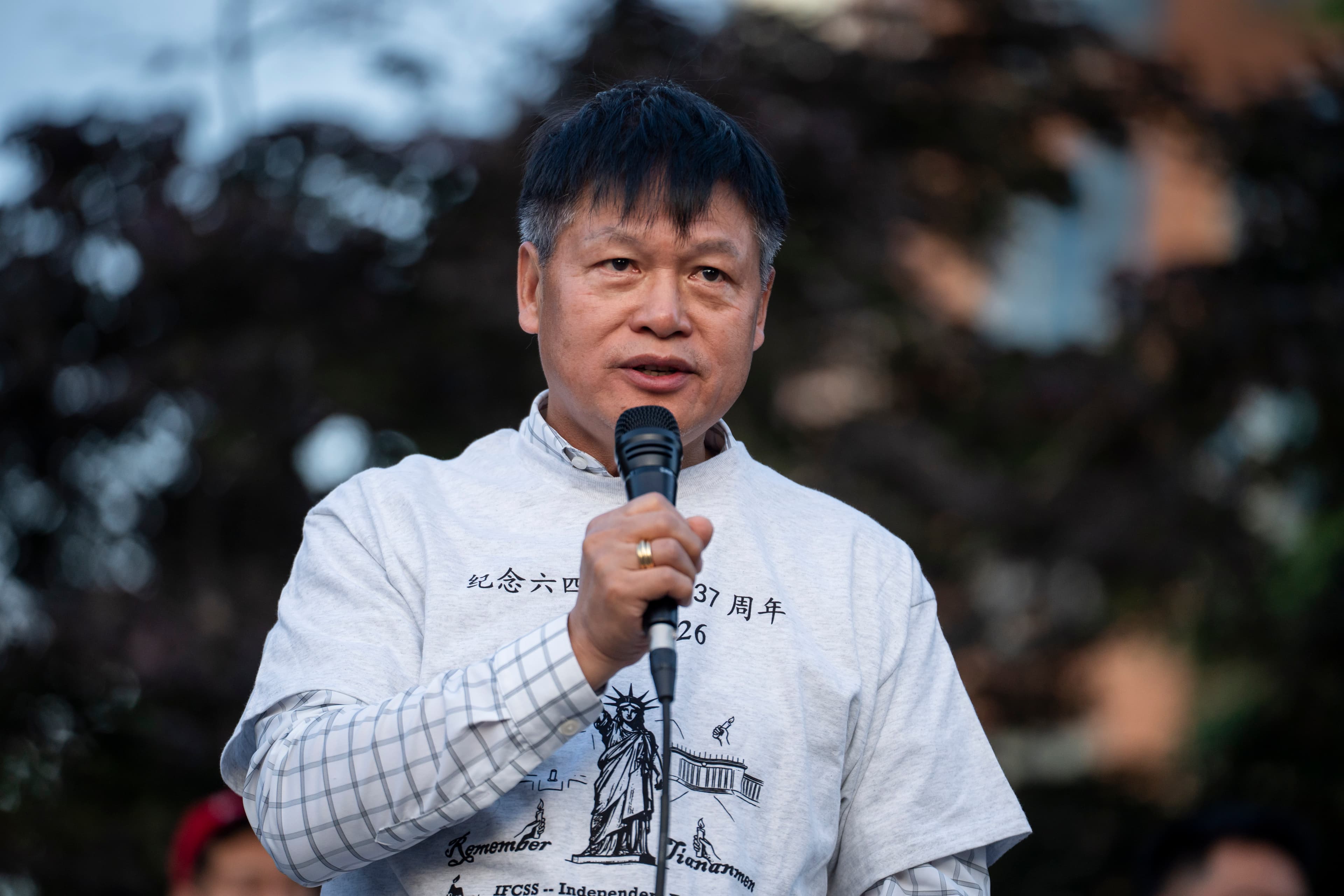 Arthur Liu, father of Olympic gold medalist Alysa Liu and a participant of the 1989 pro-democracy protests in China, speaks during the 2026 Tiananmen Square massacre candlelight vigil held at the Victims of Communism Memorial in Washington on June 4, 2026. (Madalina Kilroy/The Epoch Times)