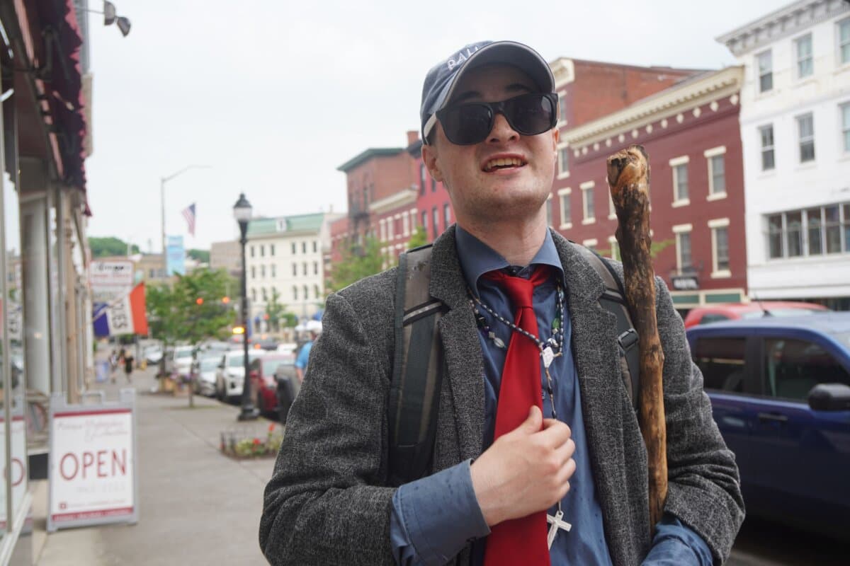 Street minister Logan Esty in Bangor, Maine, on June 6, 2026. (Nathan Worcester/The Epoch Times)