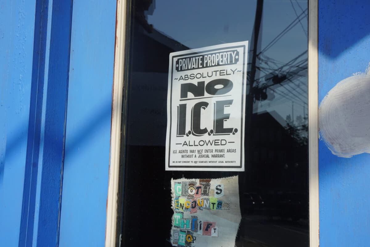 A sign warning Immigration and Customs Enforcement agents not to enter a store in Ellsworth, Maine, on June 5, 2026. Graham Platner has headquartered his campaign in Ellsworth. (Nathan Worcester/The Epoch Times)