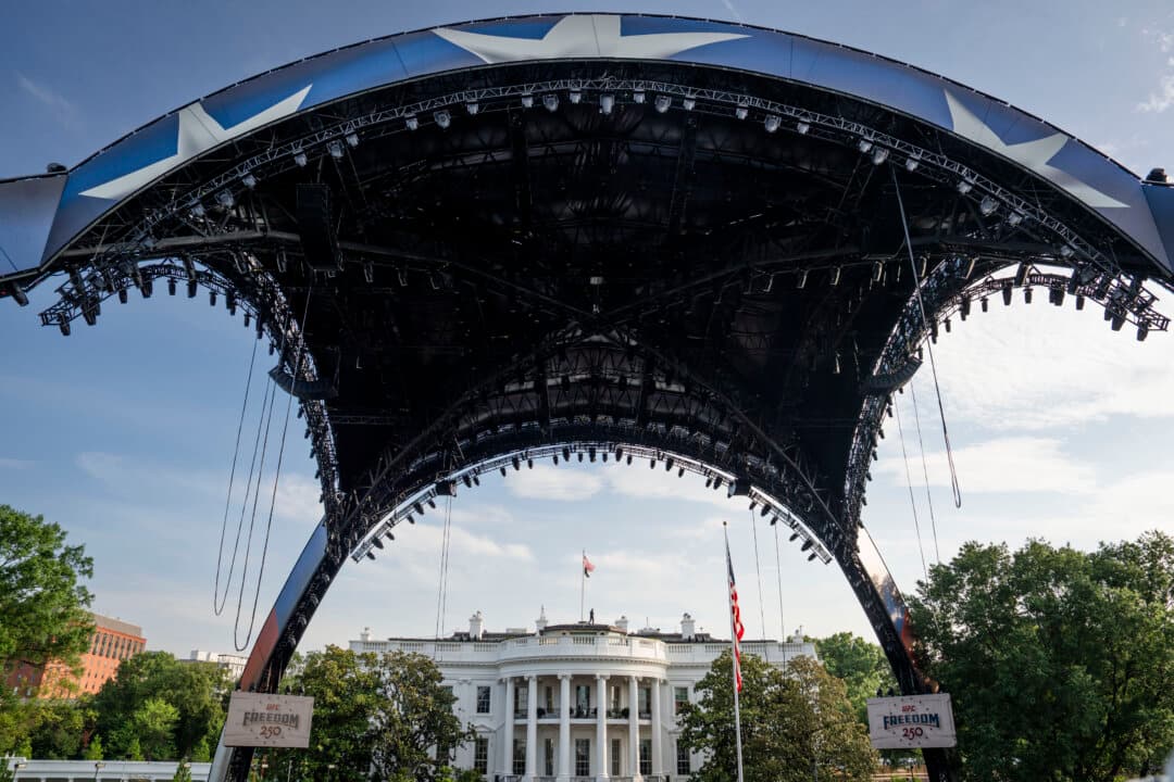The UFC octagon on the South Lawn and custom claw lighting arena rig towering on the South Lawn of the White House. The event will mark the first professional sporting event in history to be held at 1600 Pennsylvania Ave. June 14, 2026, will also be President Donald Trump's 80th birthday and Flag Day. (Madalina Kilroy/The Epoch Times)