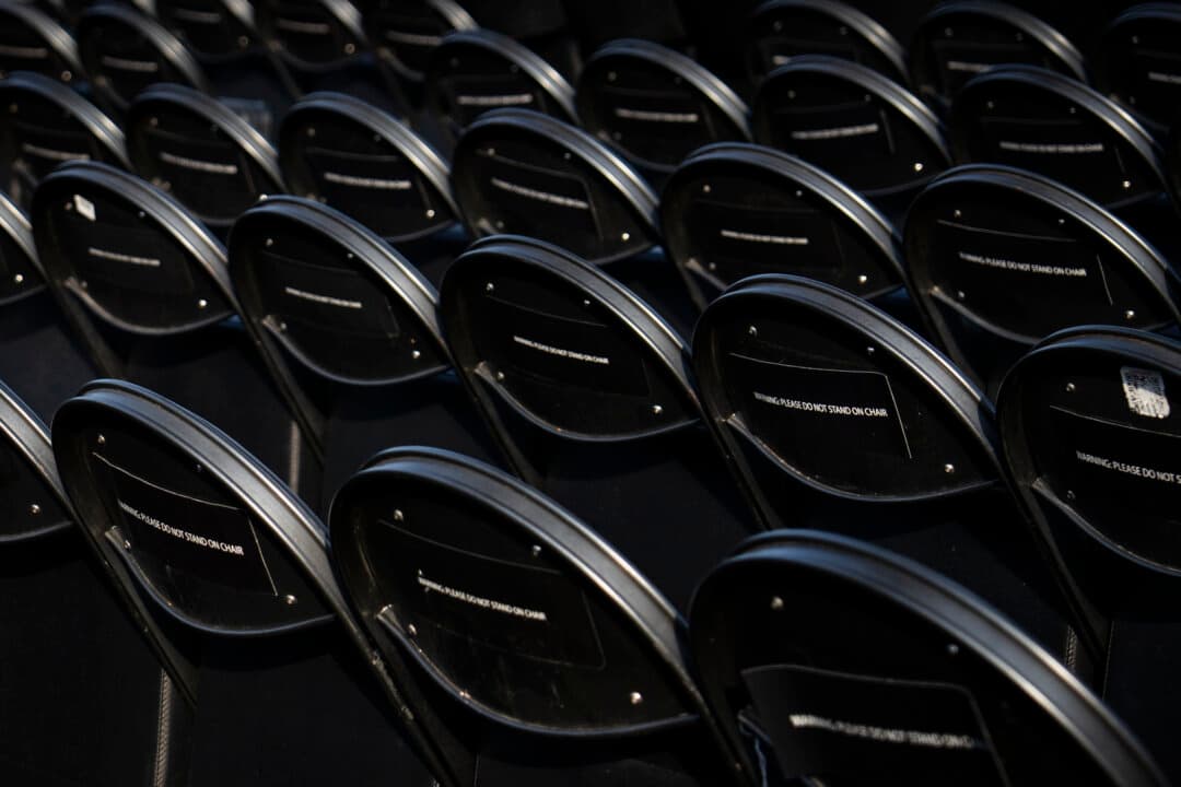 Chairs with signs that read, “Warning: Please do not stand on chair,” at the White House on June 11, 2026. (Madalina Kilroy/The Epoch Times)