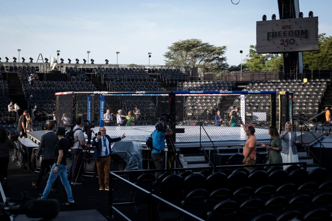 Members of the press walk through a preview of the UFC setup ahead of the UFC Freedom Fight on June 14, on the South Lawn of the White House on June 11, 2026. The first pro sporting event in history at 1600 Pennsylvania Ave. (Madalina Kilroy/The Epoch Times)