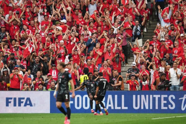 Canada's Jonathan David (C) celebrates with Stephen Eustaquio (R) after scoring his side's third goal during the World Cup Group B soccer match against Qatar in Vancouver on June 18, 2026. (Abbie Parr/AP Photo)