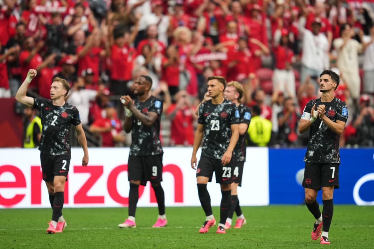Canadian players celebrate their team's win in the World Cup Group B soccer match against Qatar in Vancouver on June 18, 2026. (AP Photo/Abbie Parr)