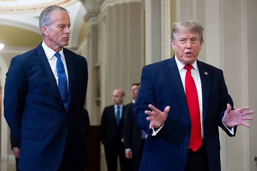 President Donald Trump walks with Senate Majority Leader John Thune (R-S.D.) on the way to a lunch meeting with Senate Republicans at the Capitol in Washington on June 24, 2026. (Saul Loeb/AFP via Getty Images)