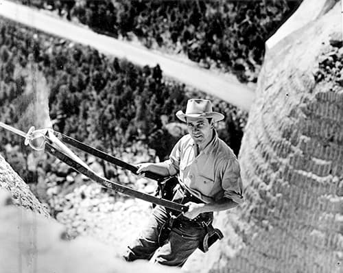 Lincoln Borglum works from a bosun chair on the side of Mount Rushmore, near Keystone, S.D., in this file photo. The son of Mount Rushmore creator Gutzon Borglum, Lincoln Borglum was his father's right-hand man for many years. (Courtesy of S.D. Historical Society)
