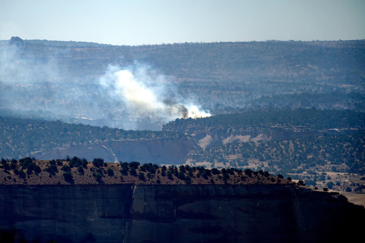 Smoke rises from the Snyder Fire burning near Thompson Springs, Utah, on June 28, 2026. (AP Photo/Noah Berger)