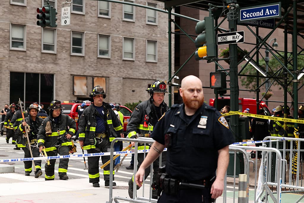 Firefighters from the New York City Fire Department (NYFD) respond to a building that was evacuated in the Manhattan borough of New York City on July 7, 2026. (Charly Triballeau/AFP via Getty Images)