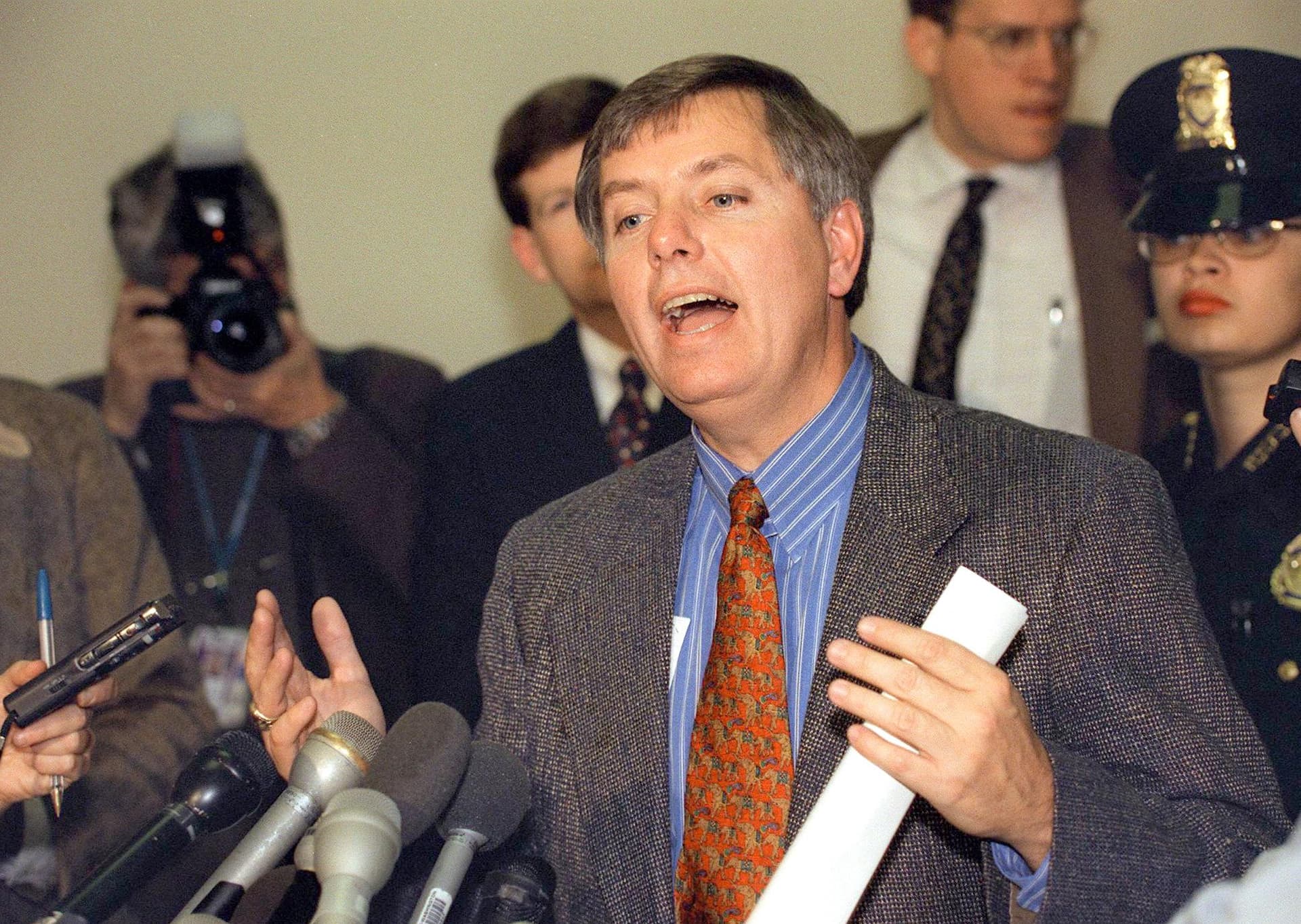 U.S. Rep. and member of the House Judiciary Committee Lindsey Graham (R-S.C.) talks to reporters after a meeting of the "House managers" at the U.S. Capitol on Dec. 29, 1998. (Tim Sloan/AFP via Getty Images)