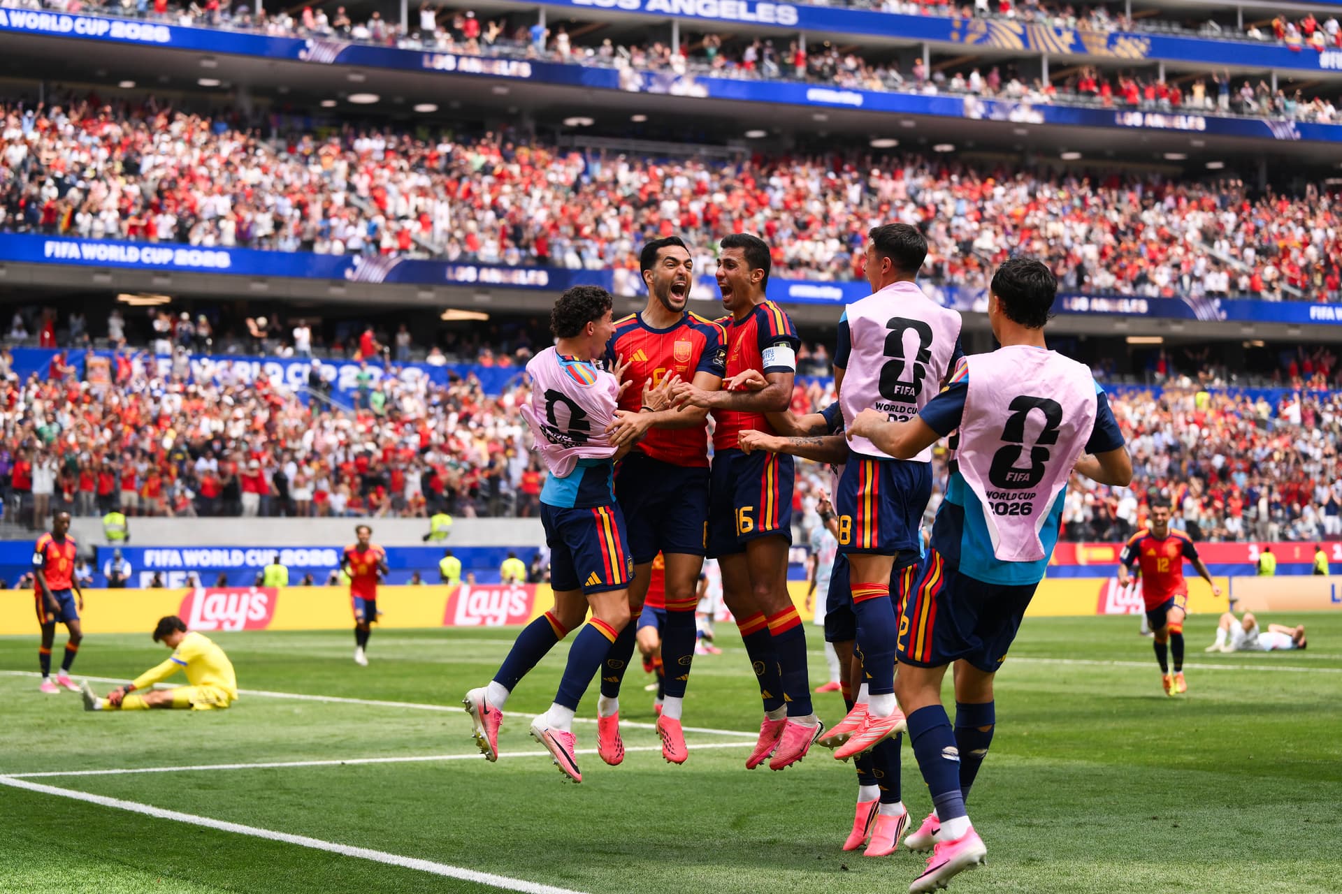 Mikel Merino #6 of Spain celebrates with his teammates after scoring his team's second goal during the FIFA World Cup 2026 quarterfinal match against Belgium at Los Angeles Stadium on July 10, 2026. (David Ramos/Getty Images)