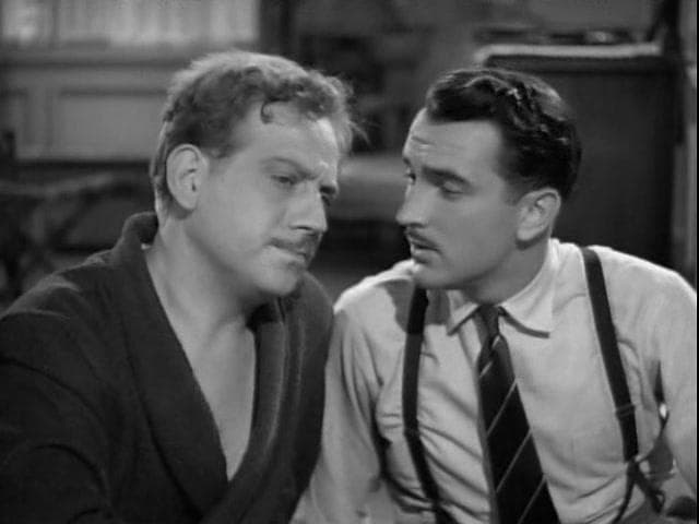 Jeff/Tony (Melvyn Douglas, L) and Philip Booth (Lee Bowman) have a discussion, in “Third Finger, Left Hand.” (Metro-Goldwyn-Mayer)