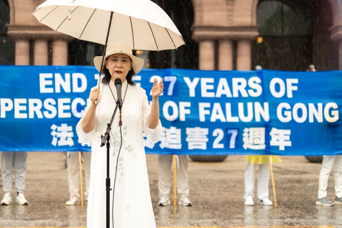 Chinese democracy activist Sheng Xue speaks at a rally to mark 27 years of CCP's persecution of Falun Gong, at Queen's Park in Toronto on July 18, 2026. (Evan Ning/The Epoch Times)