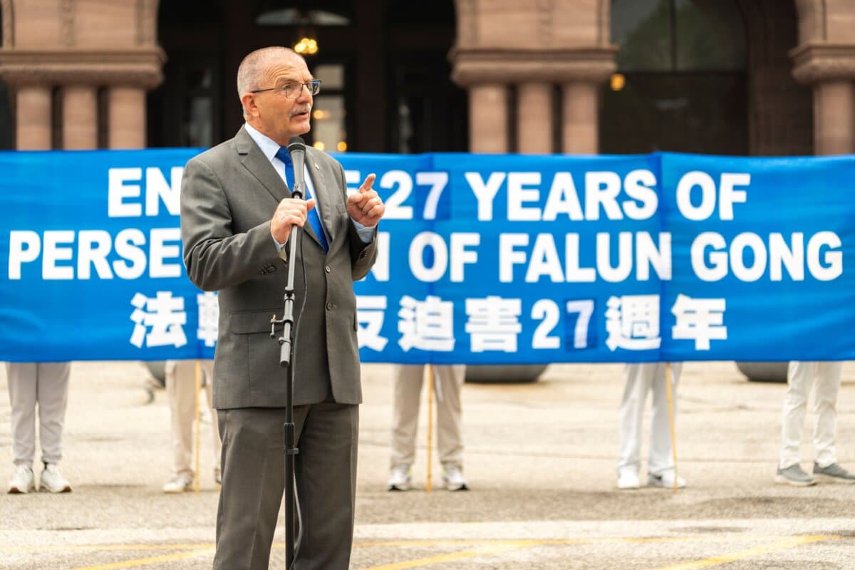 Former Conservative MP Wladyslaw Lizon speaks at a rally to mark 27 years of CCP's persecution of Falun Gong, at Queen's Park, Toronto, on July 18, 2026. (Evan Ning/The Epoch Times)