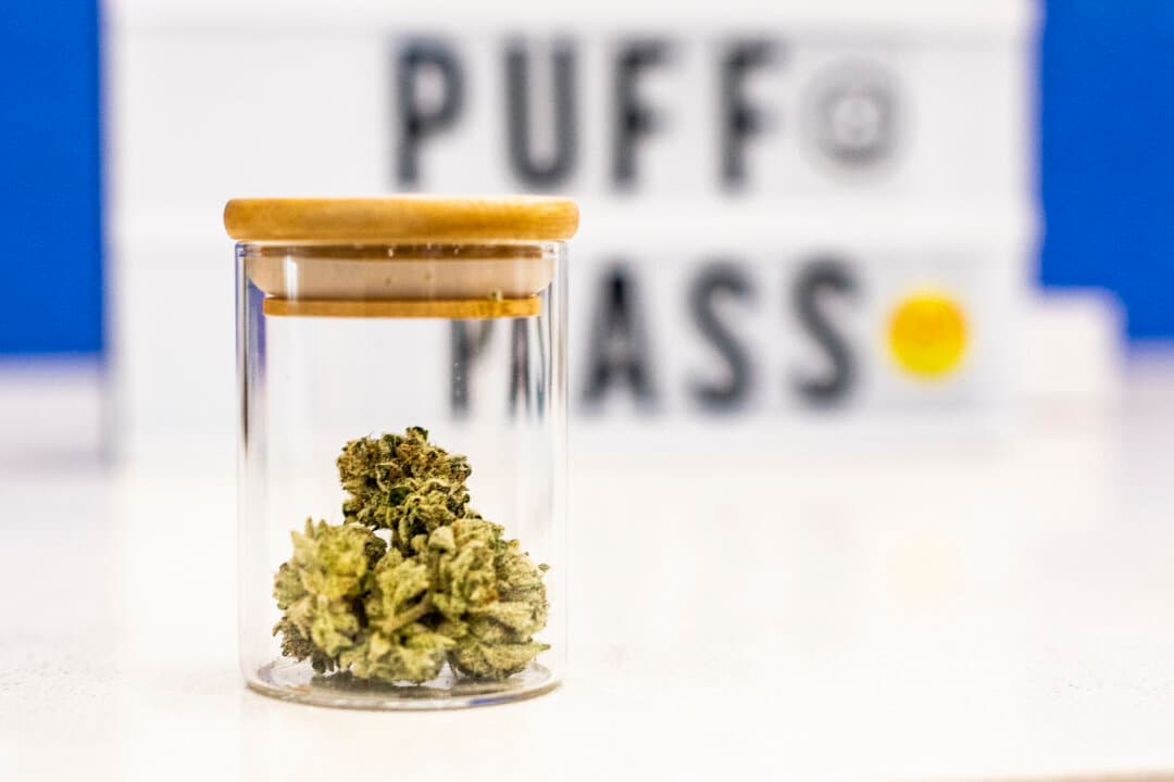 Legal marijuana samples sit on display at a cannabis dispensary in Santa Ana, Calif., on Feb. 18, 2021. California's illicit marijuana products are still making their way into various licensed cannabis retailers, according to law enforcement officials. (John Fredricks/The Epoch Times)