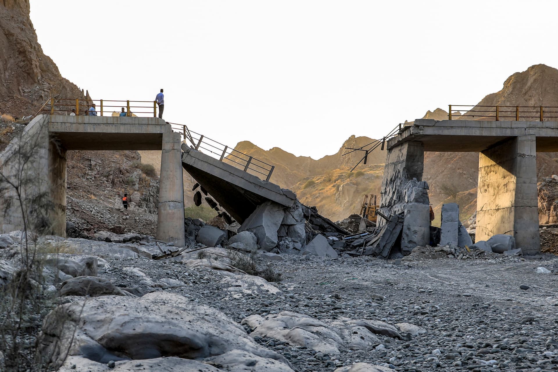A heavily damaged bridge that was hit by a U.S. strike along the road connecting Roudan and Bandar Abbas in southern Iran, on July 18, 2026. (Amir Hossein Khorgooei/ISNA/AFP via Getty Images)