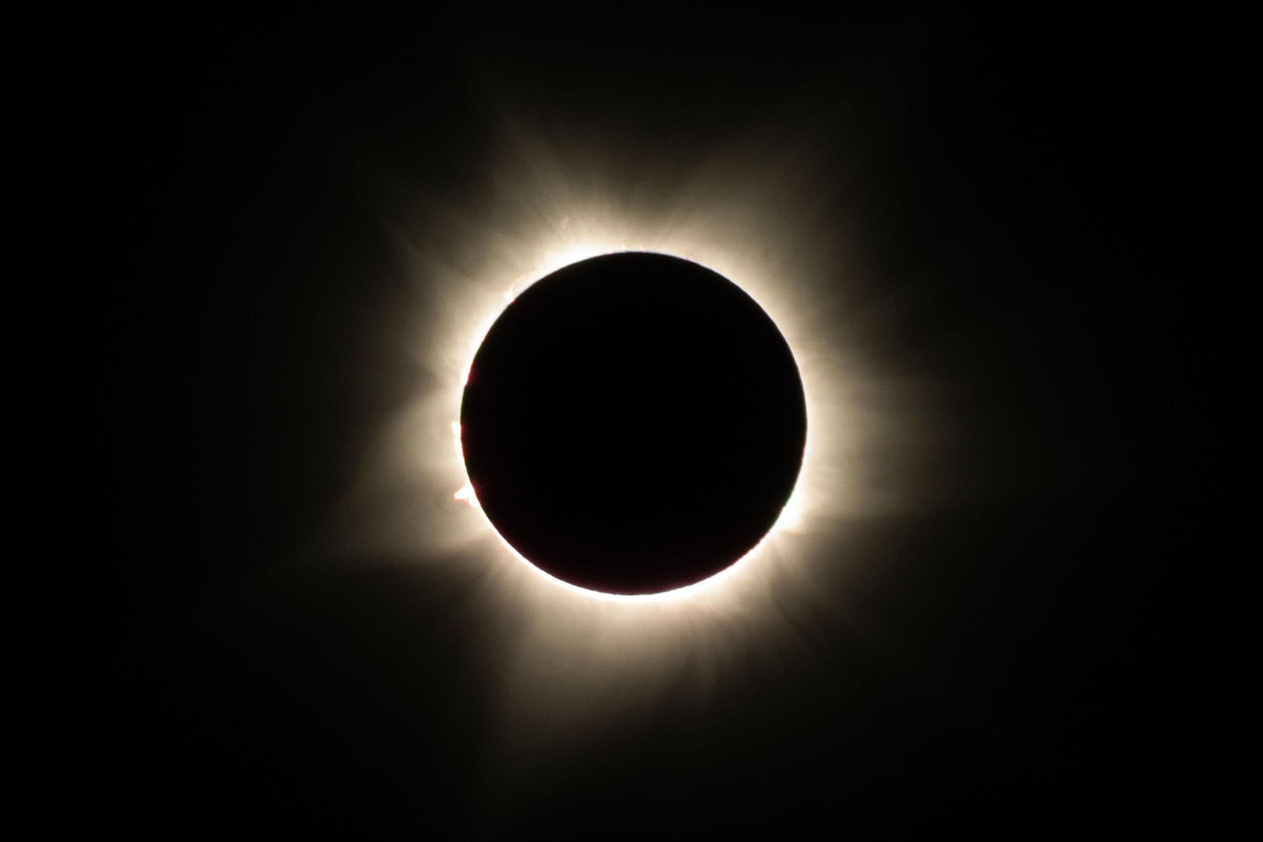 The sun’s spectacular atmosphere, called the corona, can only be seen in the moments of totality during a total solar eclipse. (Shutterstock/aeonWAVE)